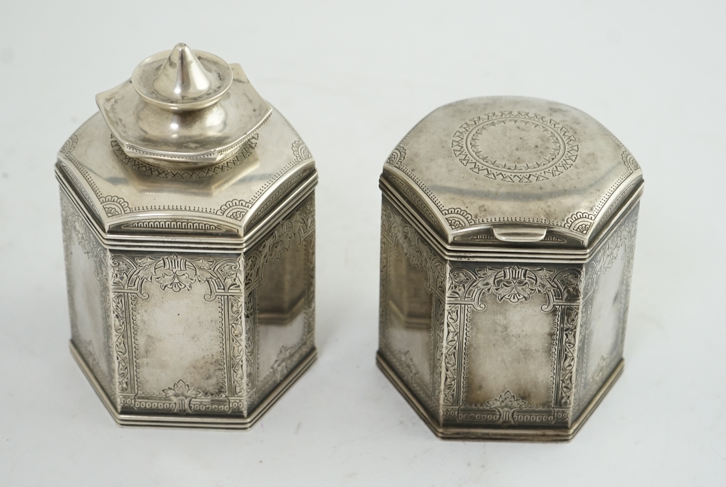 Two similar late 19th/early 20th century Russian 84 zolotnik silver tea caddies, master Varvara Baladanov